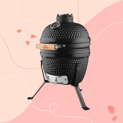 Grillmeister Ceramic Barbecue on pink background.