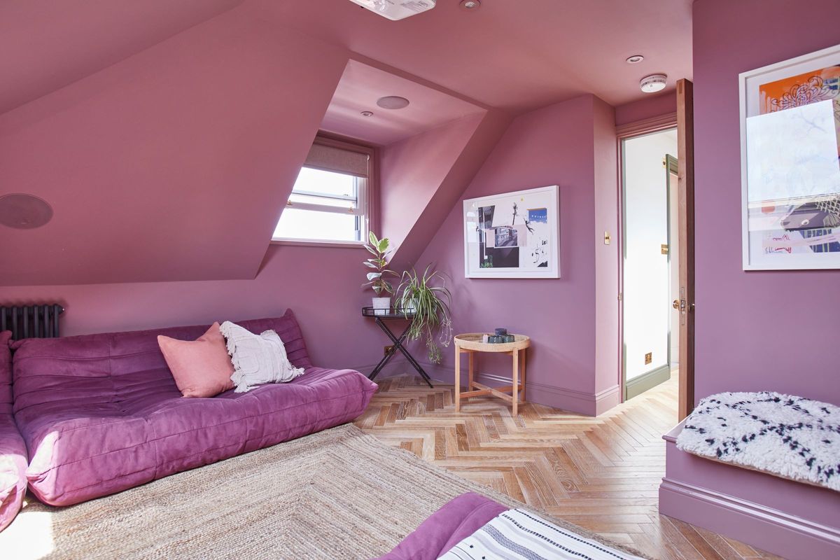 A dormer window in the loft conversion with a hallway leading into to two separate rooms