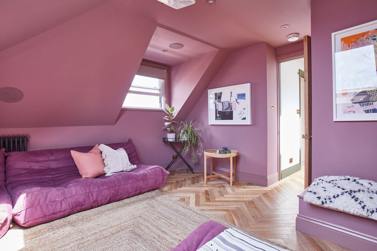 A dormer window in the loft conversion with a hallway leading into to two separate rooms