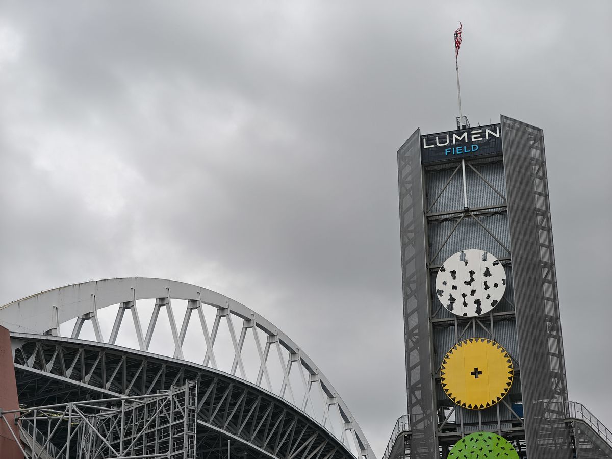 A tower with the words "Lumen Field" on it
