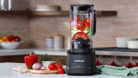 Nutribullet Power Core blender containing vegetables on kitchen counter