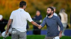 Farmers Insurance Open: Nicolai Hojgaard of Denmark (L) and Stephan Jaeger of Germany shake hands on the 18th green after finishing their round during the third round of the Farmers Insurance Open