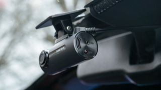 Thinkware F70 dash cam mounted on front windshield
