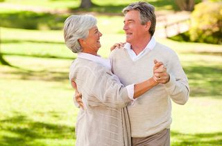 Old couple dancing ways to live to 100