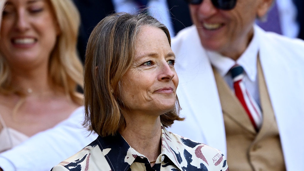 Actor Jodie Foster watches the tennis from the Royal Box on Centre Court at Wimbledon.