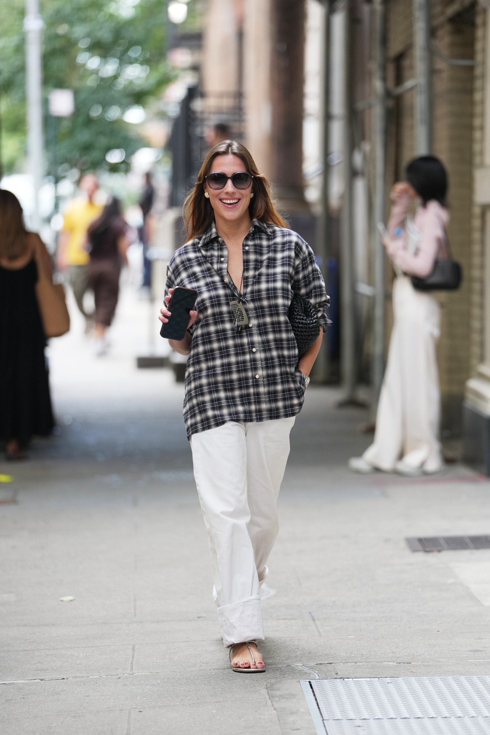 A guest wearing the flannel shirt trend at New York Fashion Week 2026
