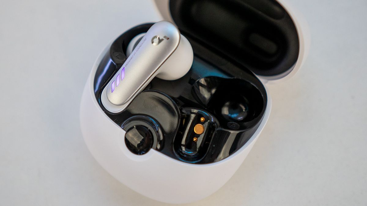 The charging pins inside the case of the Soundcore VR P10 earbuds for Meta Quest