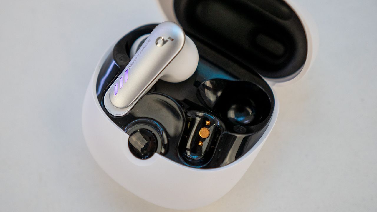 The charging pins inside the case of the Soundcore VR P10 earbuds for Meta Quest