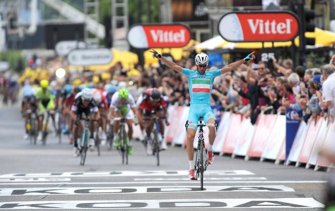 Vincenzo Nibali holds off his chaser to win stage 2