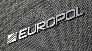 Europol logo and badge pictured on the exterior of the Europol headquarters in The Hague, Netherlands.