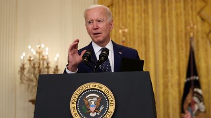 picture of President Biden giving a speech at a podium