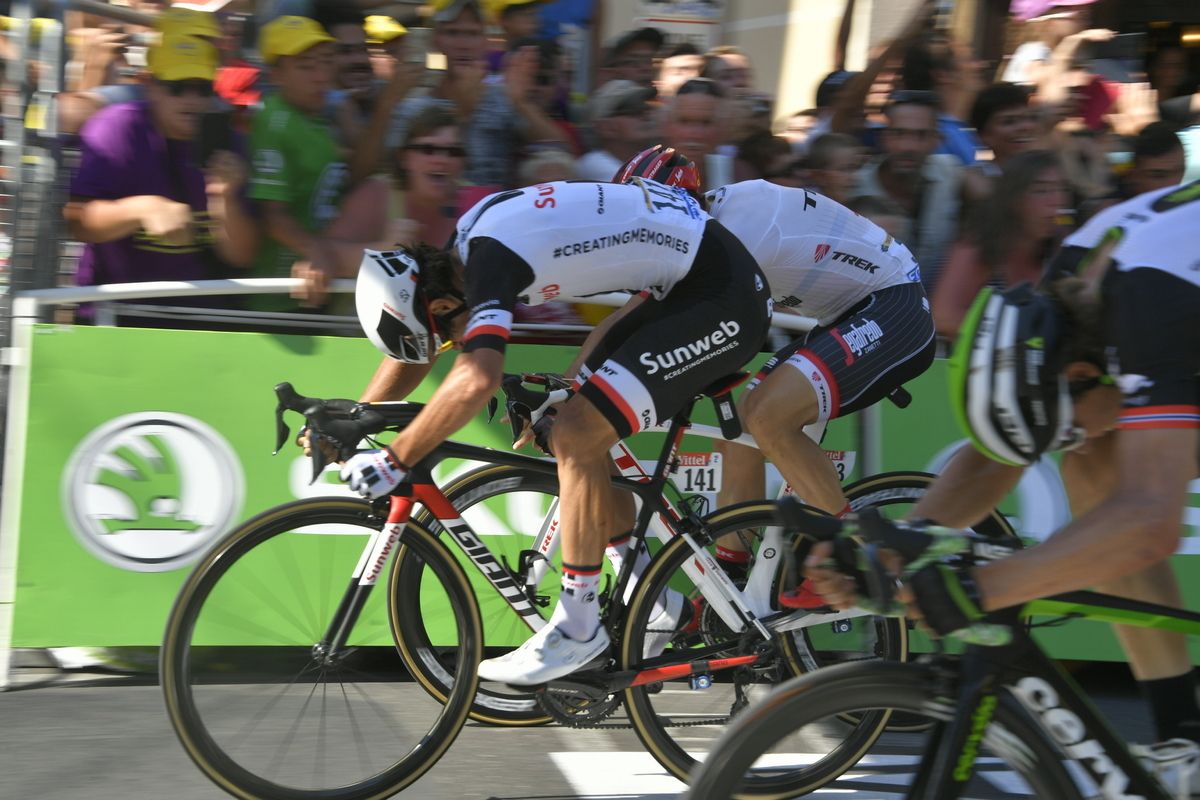 Michael Matthews throws his bike over the line in Romans-sur-Is&egrave;re to take his second win of the Tour