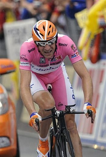 Denis Menchov crosses the finish line of the final stage of the Giro d'Italia.