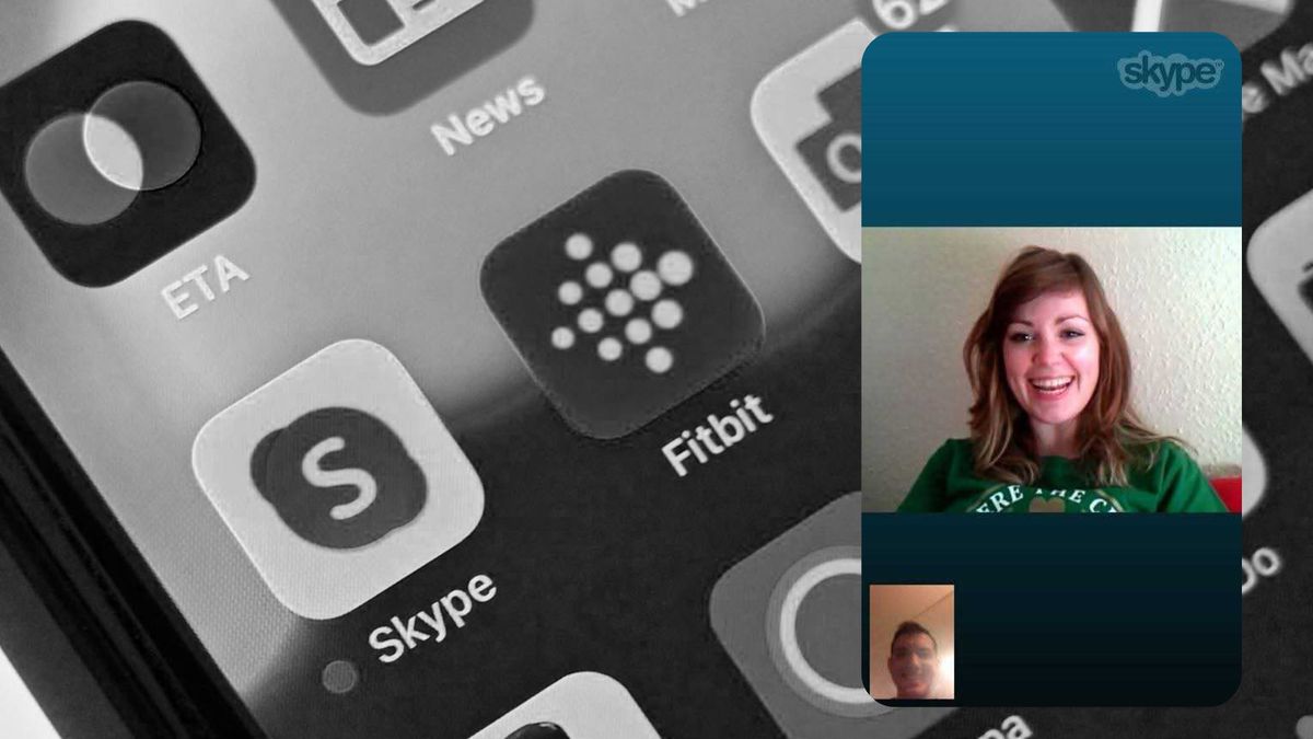 A Skype call from a phone overlayed over a larger image of the Skype icon on a phone screen