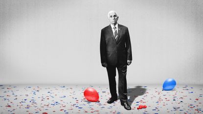 Mike Pence standing amid confetti and balloons