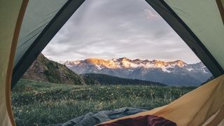 view of mountains from a tent