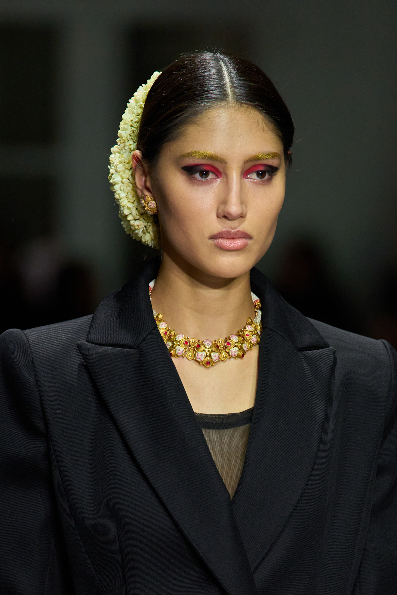 A model at Bibhu Mohapatra wearing regal tones, a key Fashion Week Autumn/Winter 25 beauty look