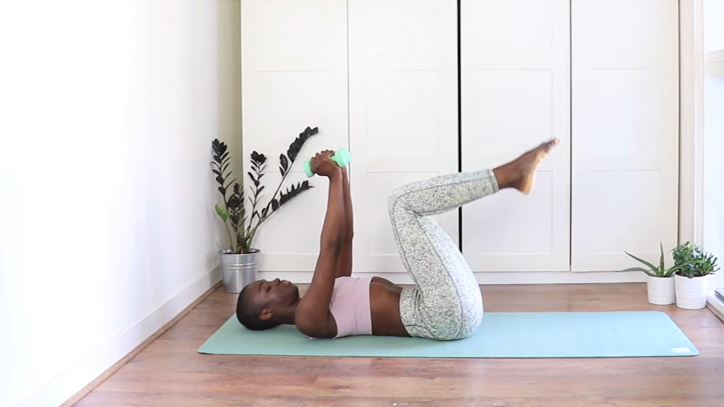 Use this at-home Pilates workout with weights to strengthen your entire body