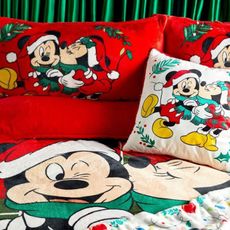 bedroom with christmas mickey mouse bedding