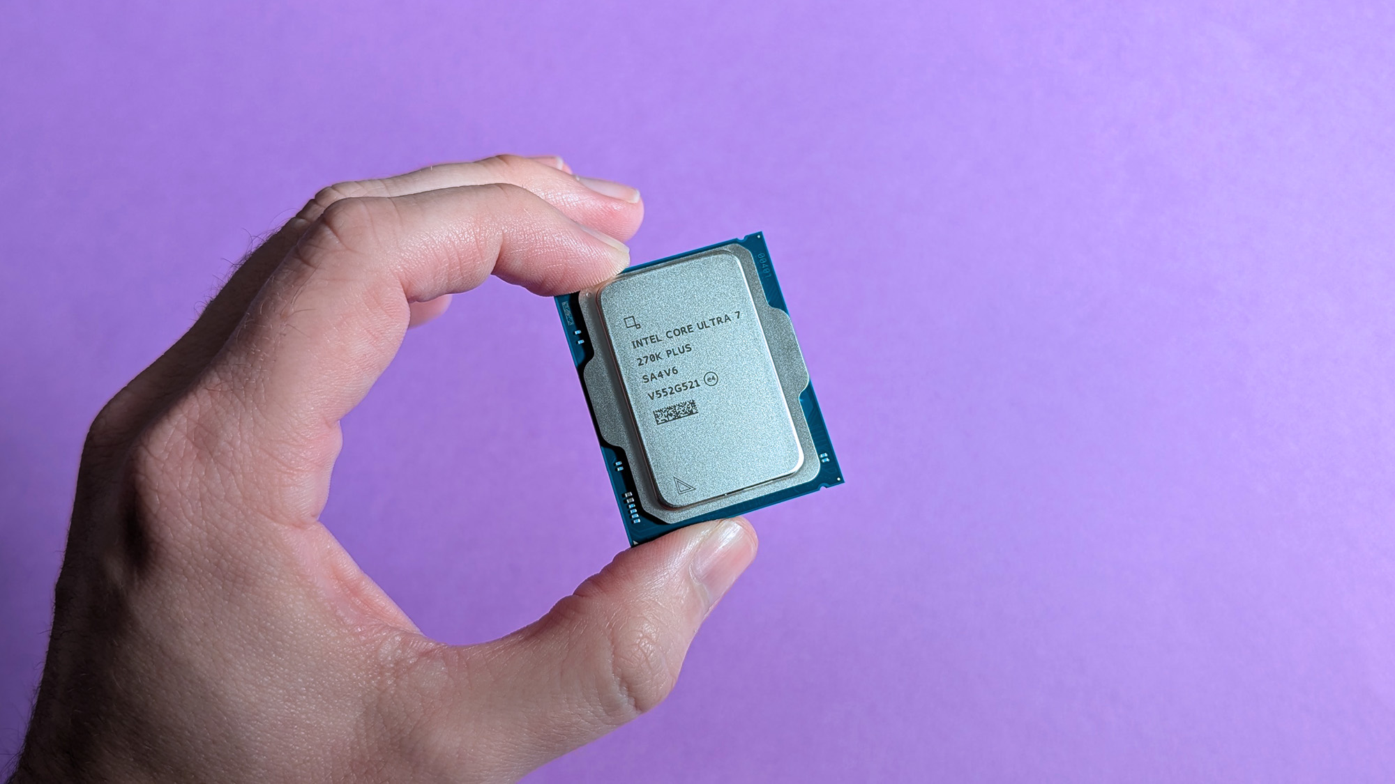 Intel Core Ultra 7 270K Plus desktop processor held in hand