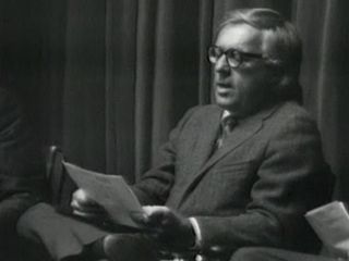 Ray Bradbury reads his poem "If Only We Had Taller Been" in this still from a NASA video shot in November 1971.