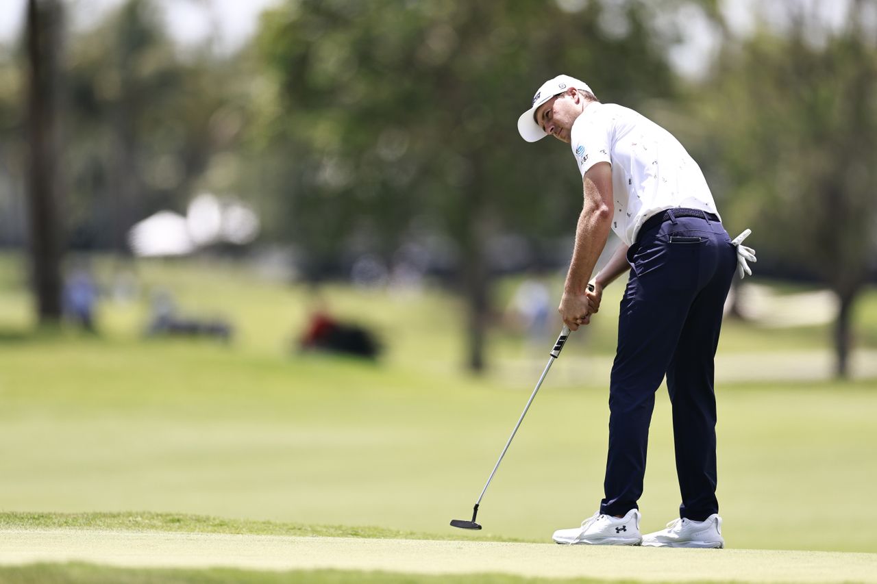 Jordan Spieth putts on the 11th green during the first round of the Cadillac Championship