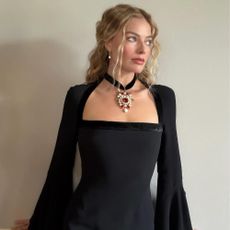 Margot Robbie and Jacob Elordie wear matching signet rings