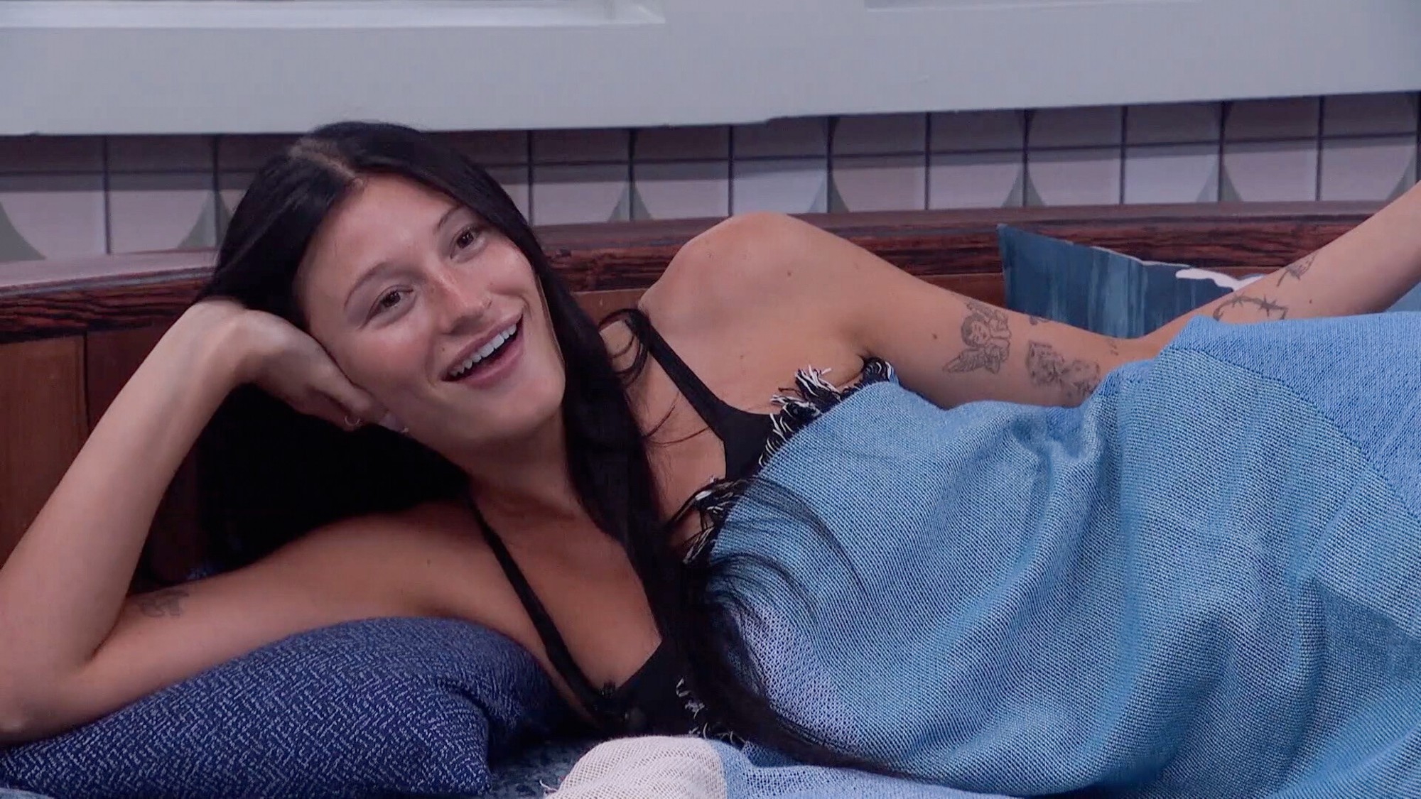 Ashley lounging in the Big Brother house