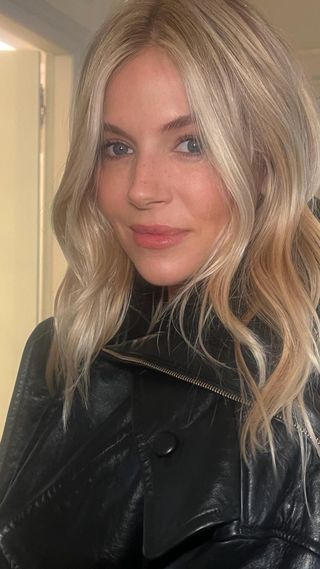 Sienna Miller with loose waves hairstyle