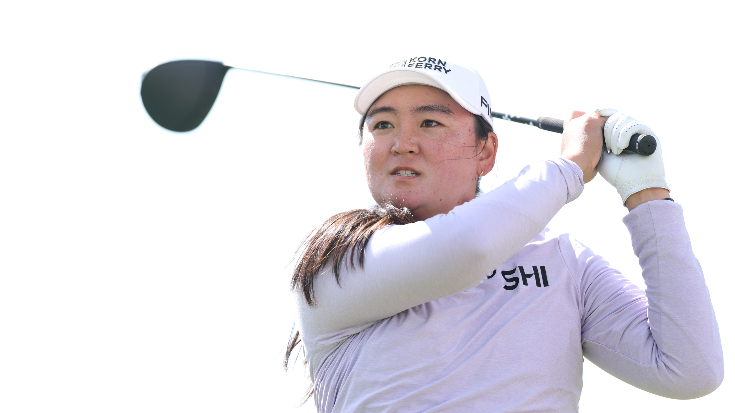 Allisen Corpuz holds her finish on a drive