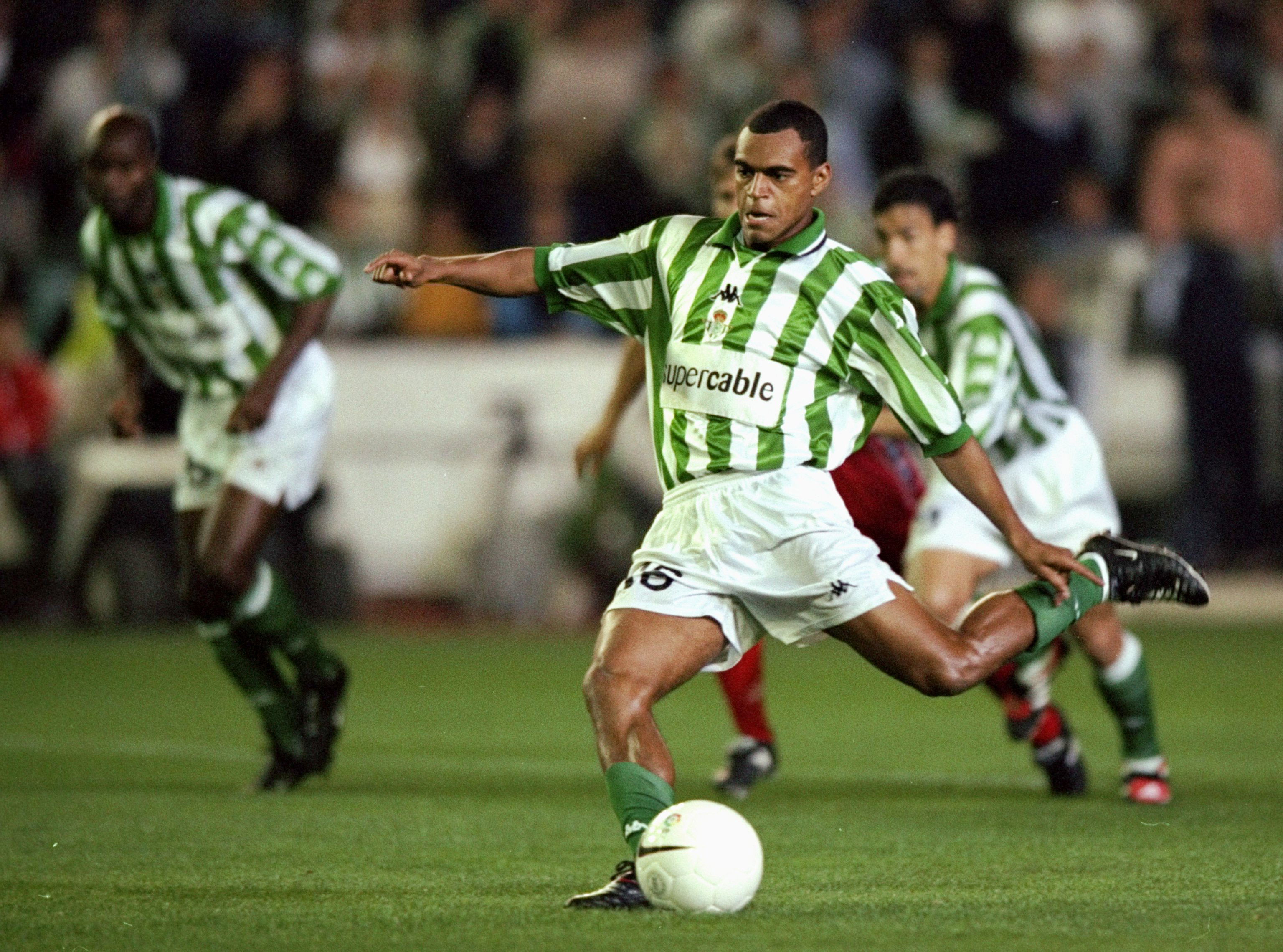 Denilson scores a penalty for Real Betis against Sevilla in February 2000.