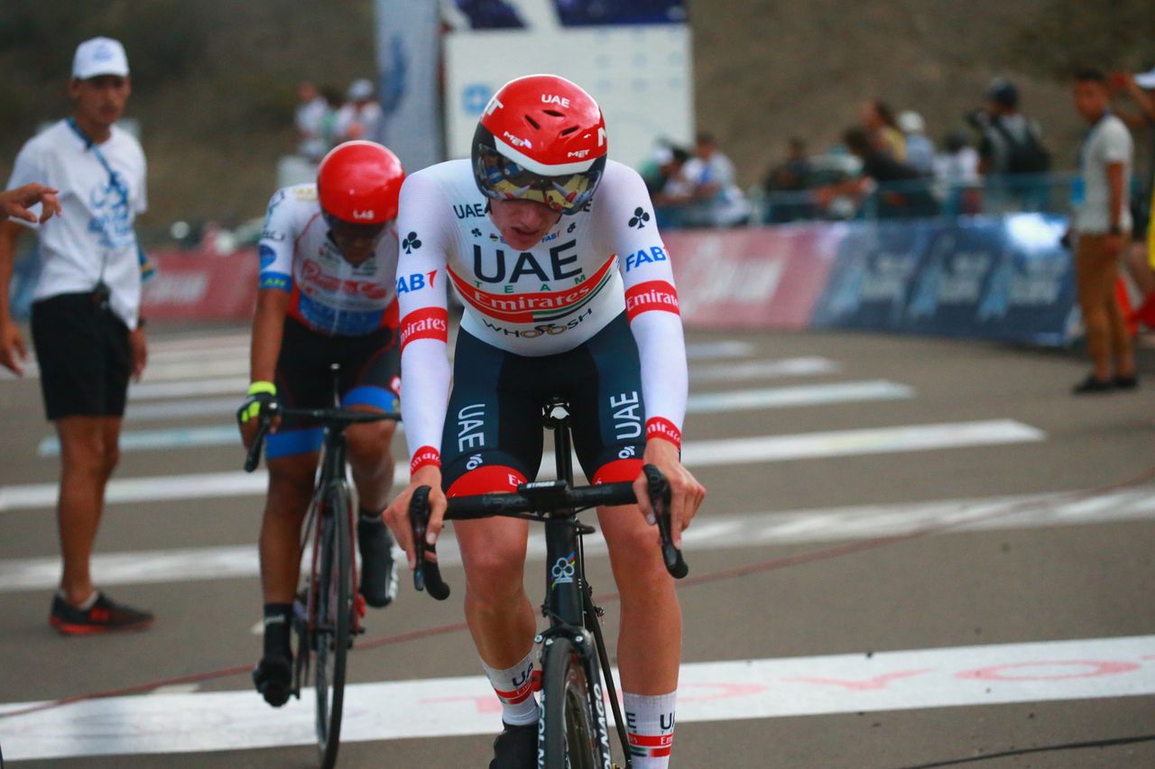 McNulty catches a rider and crosses the line