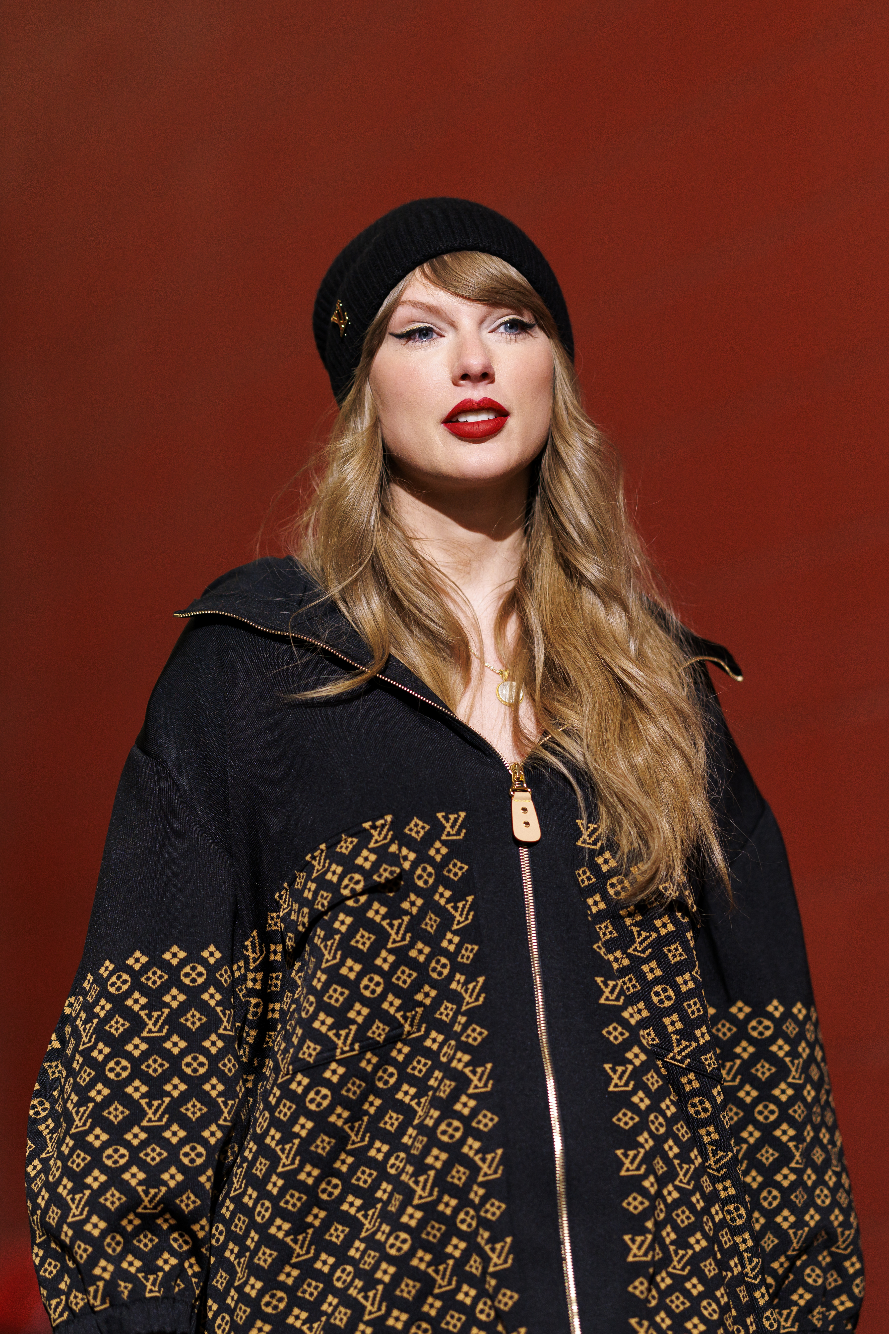 Taylor Swift wearing a Louis Vuitton jacket