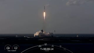A veteran SpaceX Falcon 9 rocket carrying 52 Starlink internet satellites and two customer payloads launches from Pad 39A of NASA's Kennedy Space Center in Cape Canaveral, Florida on May 15, 2021.