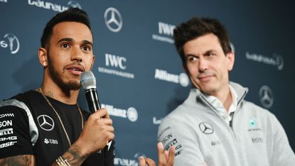 Formula 1 world champion Lewis Hamilton and Mercedes team boss Toto Wolff