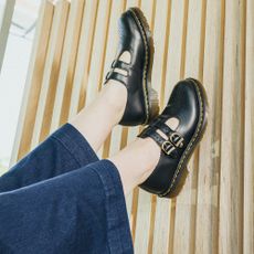 Close up of someone wearing Dr Martens Mary Jane shoes 