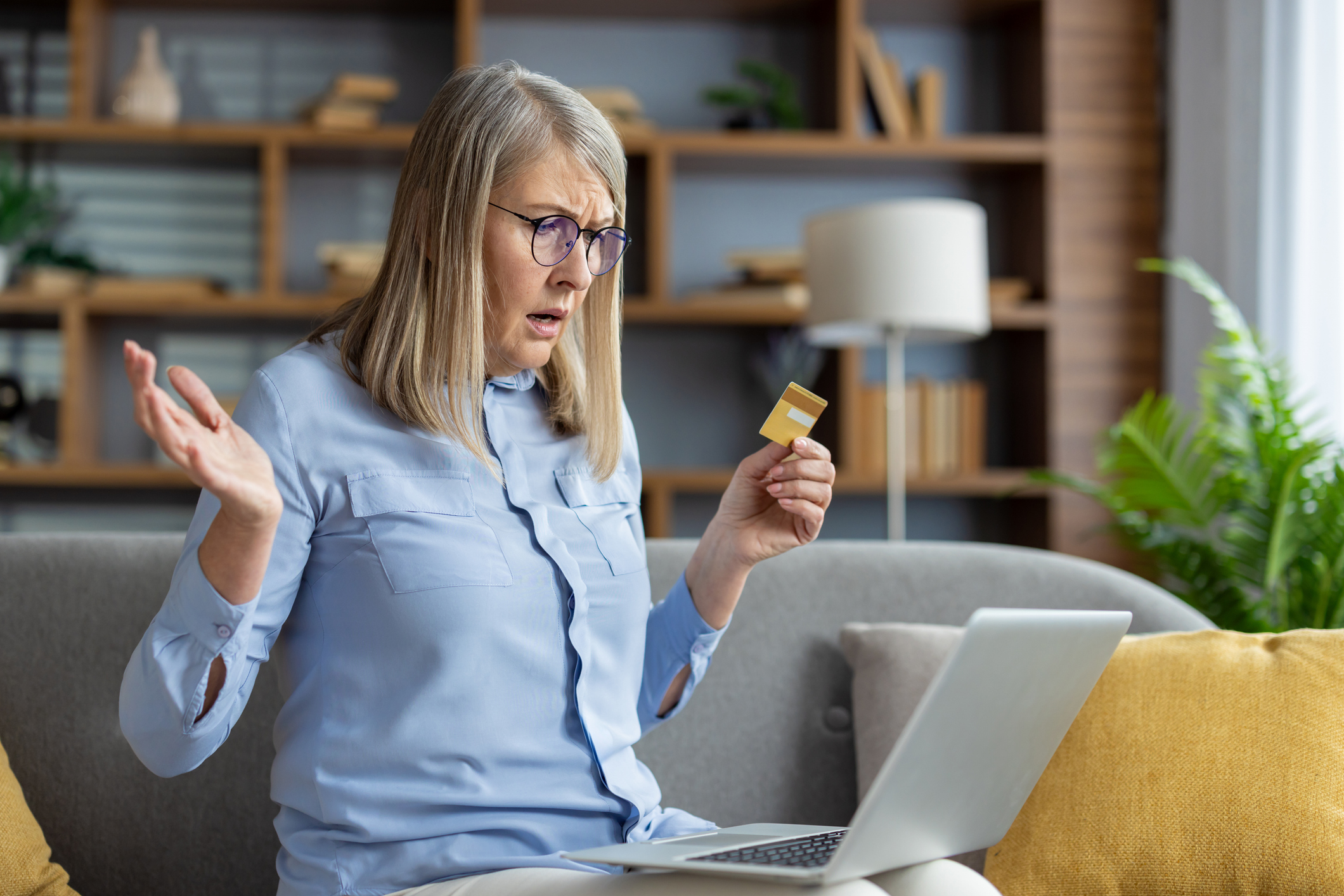 a woman finds incorrect information when on her computer