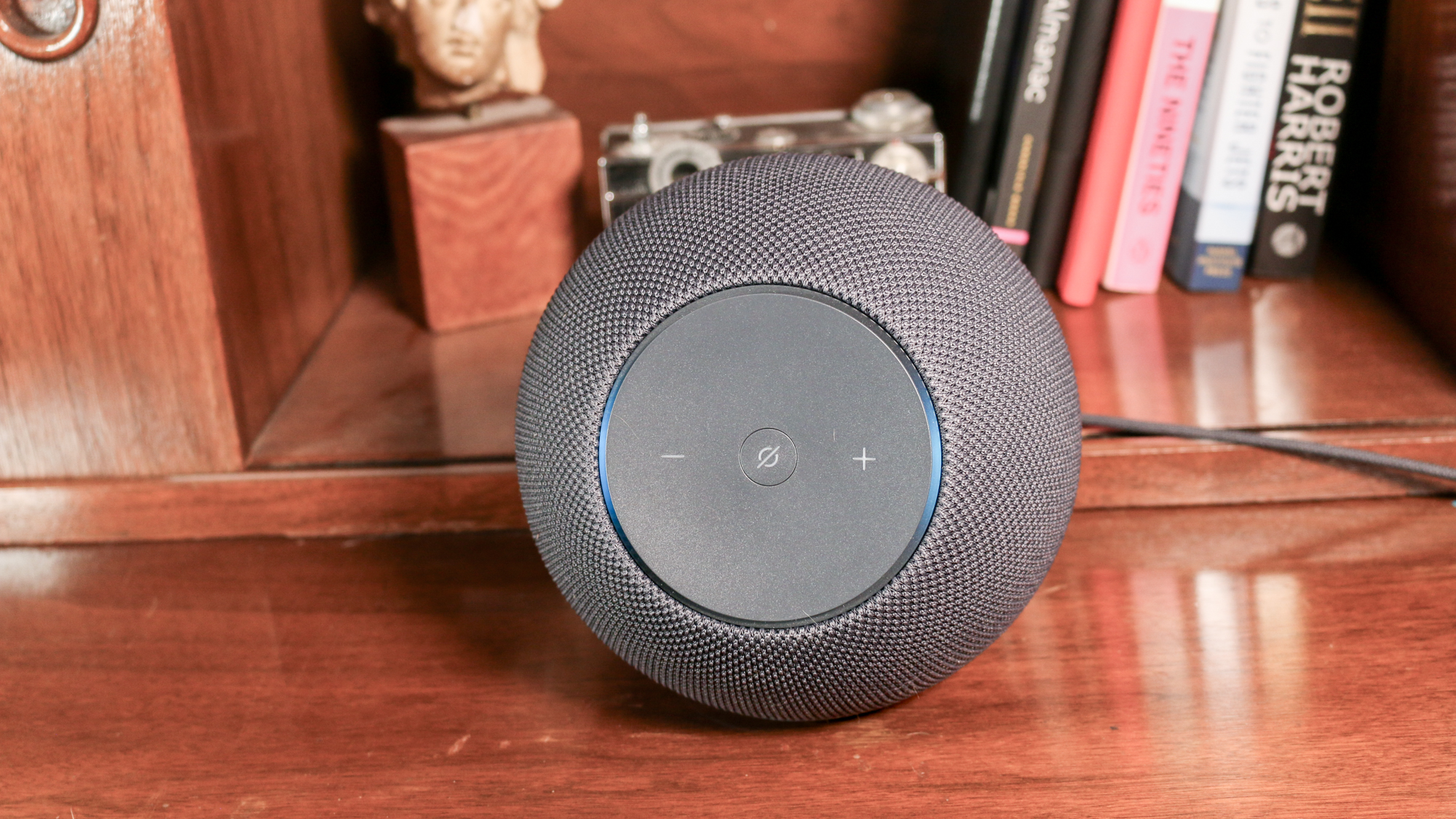 Amazon Echo Studio on a book shelf