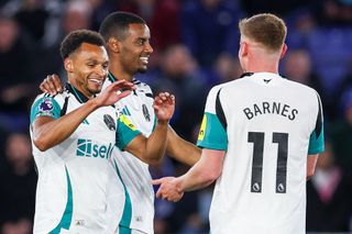 Jacob Murphy of Newcastle United celebrates with teammates Alexander Isak and Harvey Barnes after scoring his second goal during the Premier League match against Leicester City at the King Power Stadium in Leicester, England on 7 April, 2025.
