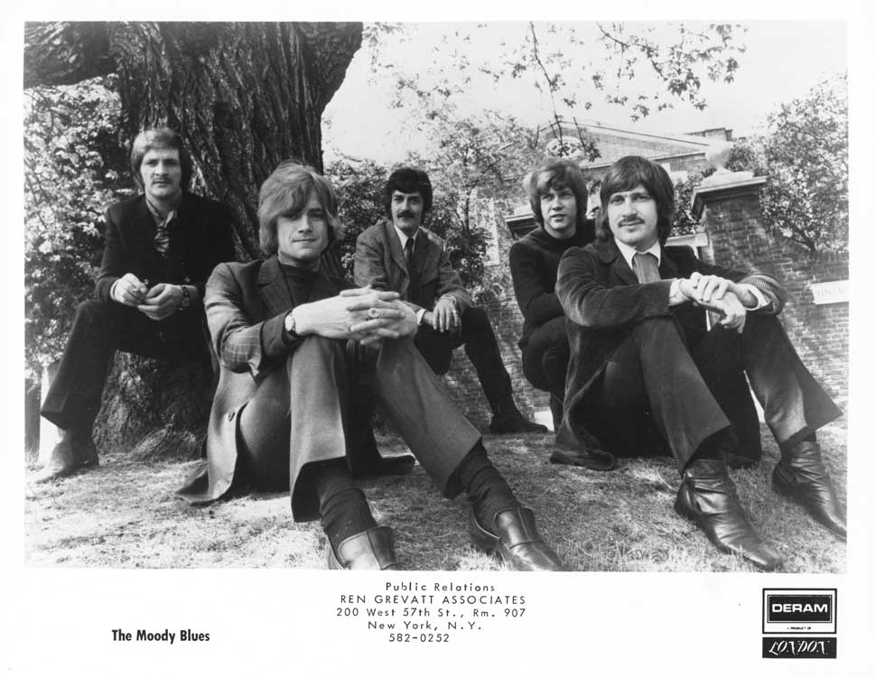 The Moody Blues sitting under a tree, circa 1970