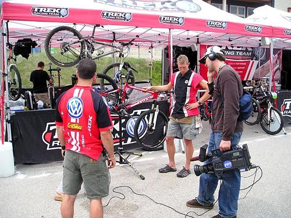 a local TV film crew gets the lowdown on race bikes from Zack Vestal(Trek-VW)