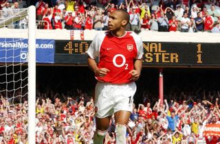 Thierry Henry celebrates after scoring for Arsenal against Leicester City on the final day of the 2003/04 Premier League season