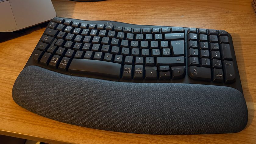 Logitech Wave Keys on wooden desk