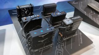 A selection of SSD coolers from the Team Group booth at Computex 2024