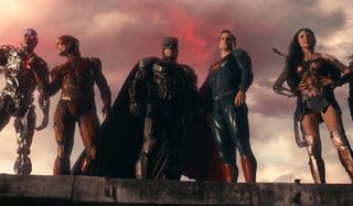 Justice League most of the line-up looking down from a roof