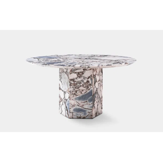 Marble pedestal dining table.
