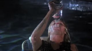 Chris Holmes drinks in the pool in The Decline of Western Civilization Part II: The Metal Years