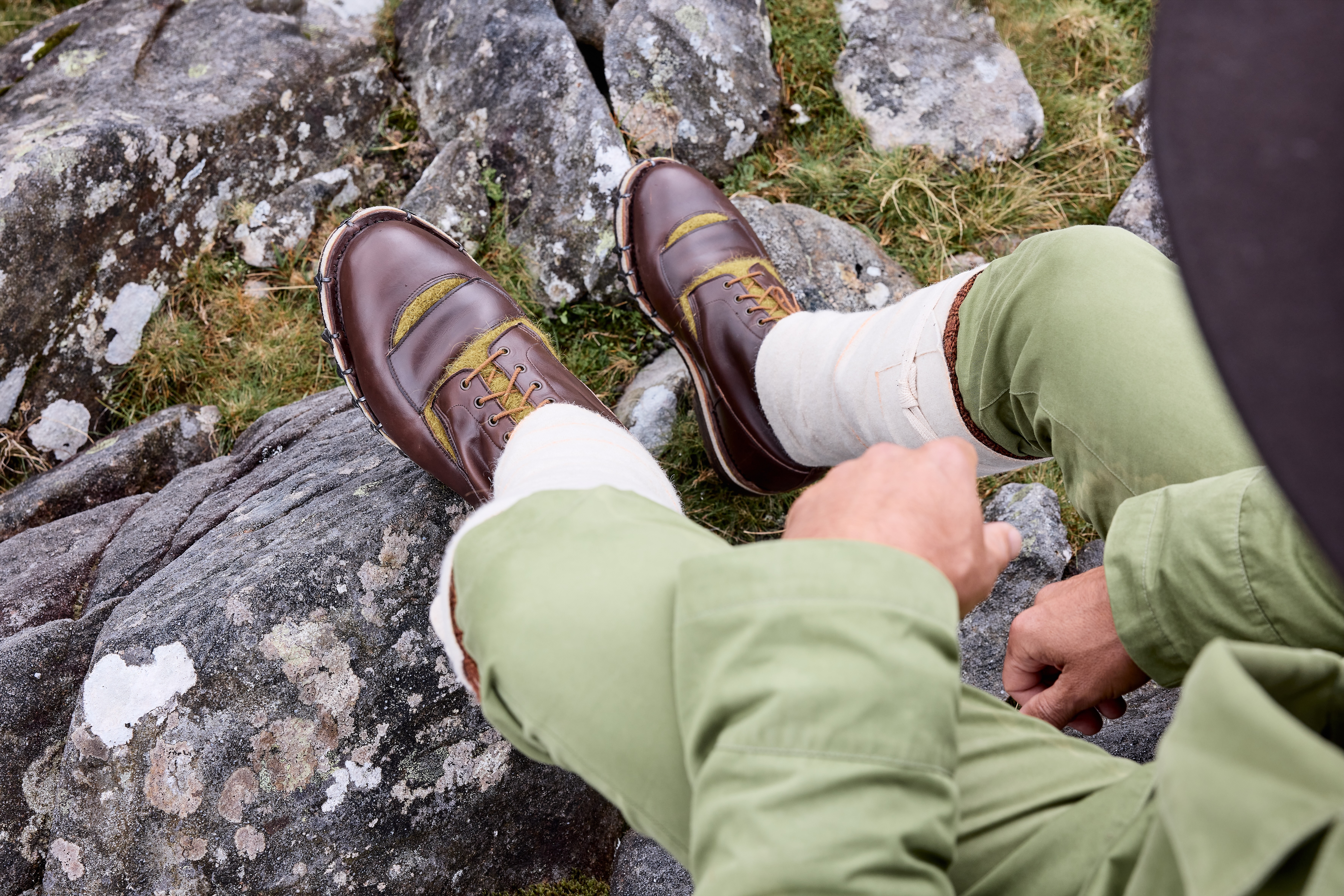 Man&#039;s feet in 1900&#039;s replica climbing shoes