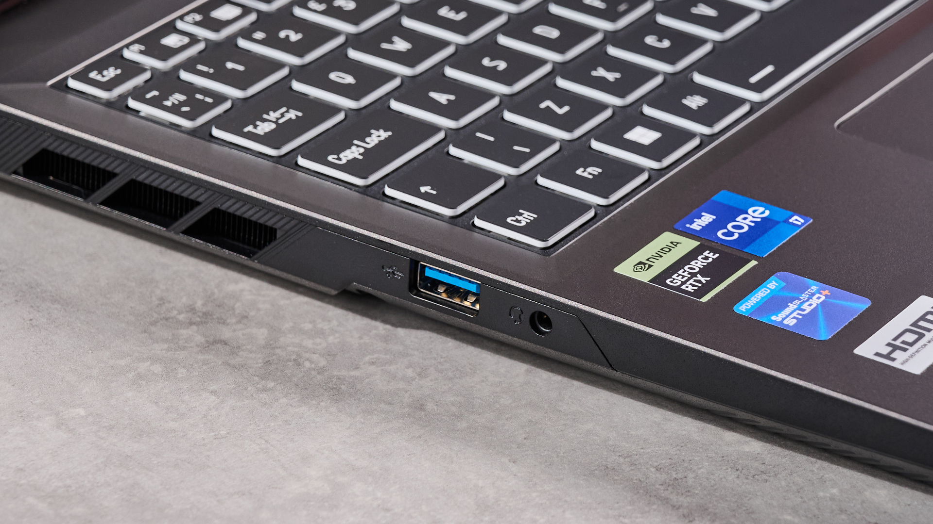 Close-up of left-side ports on PC Specialist Defiance II 16