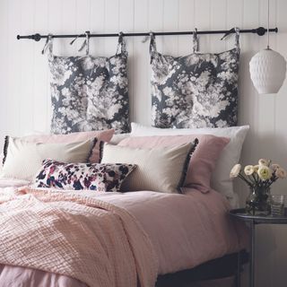 Bedroom with a cushion headboard